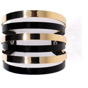 A black and gold bracelet is shown.