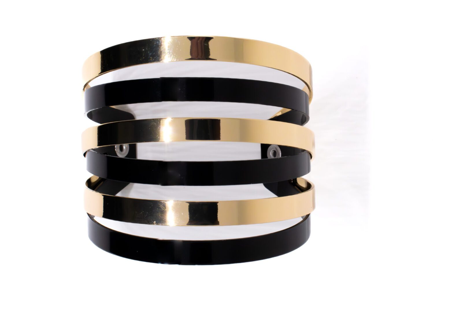 A black and gold bracelet is shown.