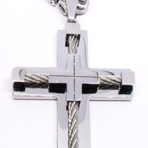 A cross with two twisted wires attached as an accent