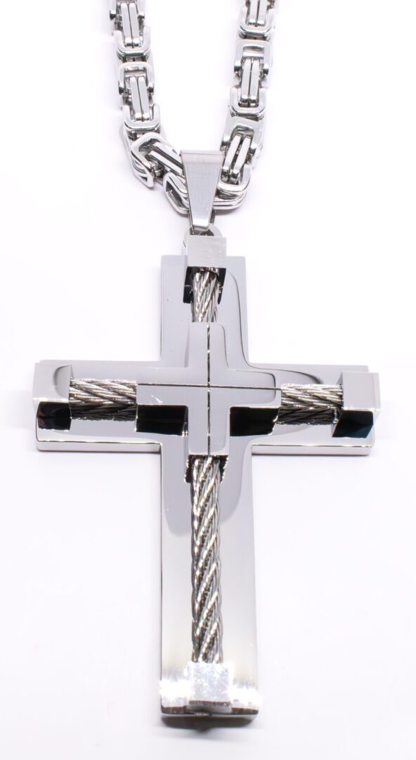 A cross with two twisted wires attached as an accent